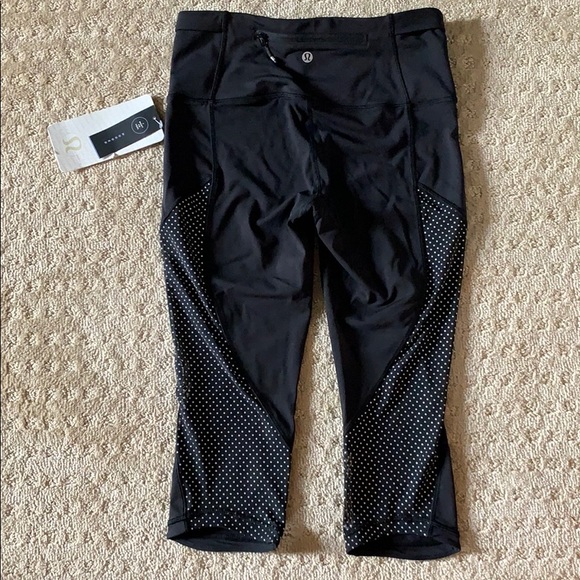 Run with the sun crop lululemon leggings. Reflective dots. - Picture 2 of 2